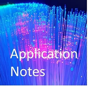 Picture of blue and purple gowing optical fibres with words Application Notes in white